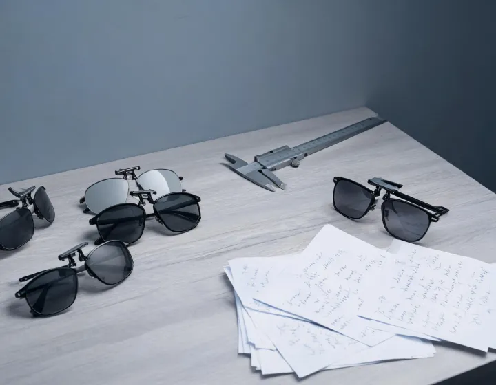 Independent sourcing desk reviewing clip-on sunglasses specifications